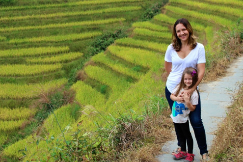 Carly and Luna hiking through the rice fields in Longsheng